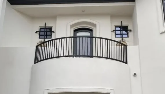Dark finish wrought iron railing installed on a Las Vegas balcony.