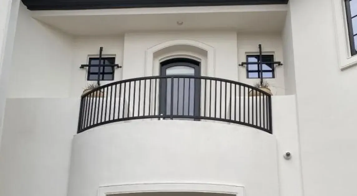 Dark finish wrought iron railing installed on a Las Vegas balcony.